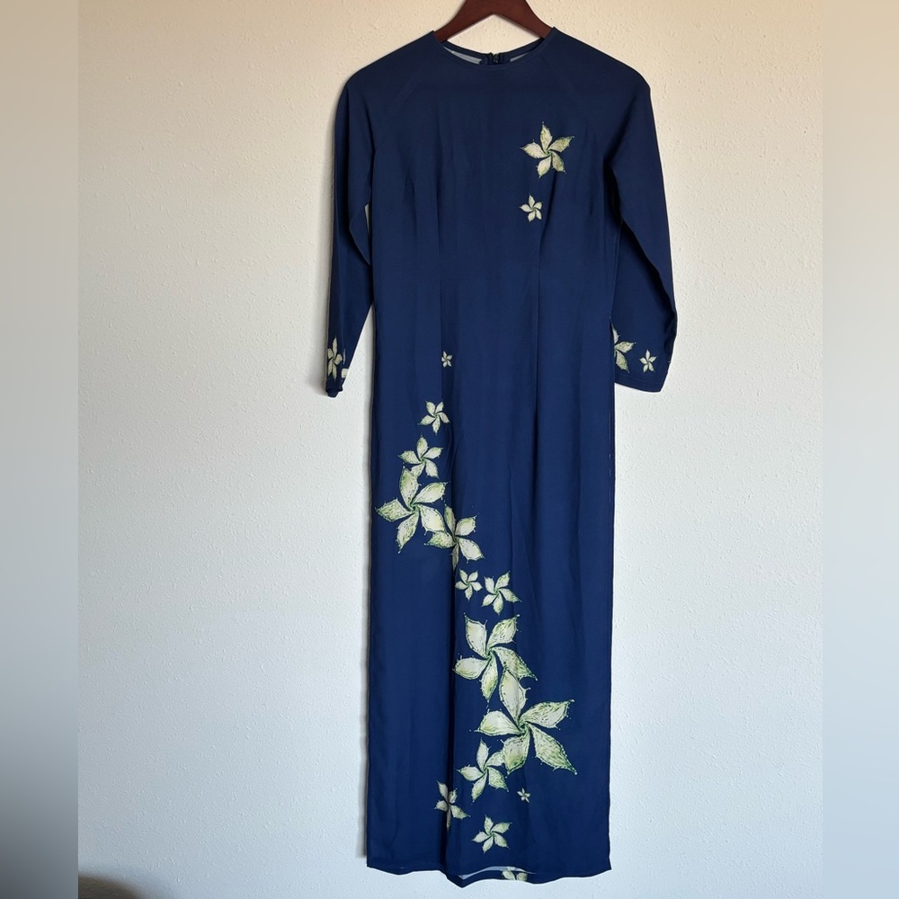 Navy blue traditional Vietnamese ao dai dress with floral design